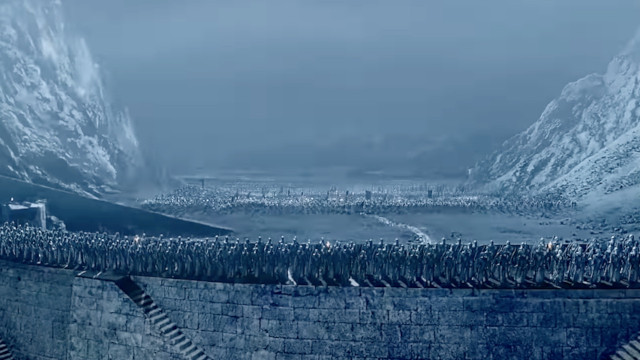 Horde of Orcs approaching Helm's deep in the night, shot from The Lord of the Rings movie